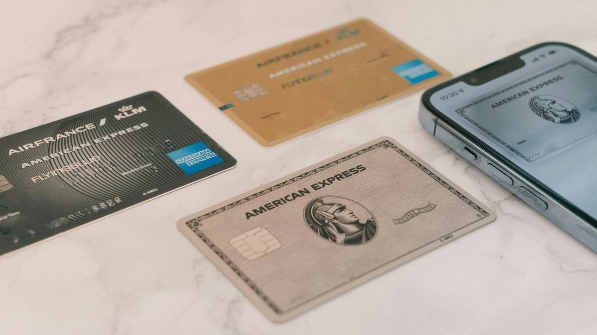 Credit cards and smartphone side by side illustrating different payment methods