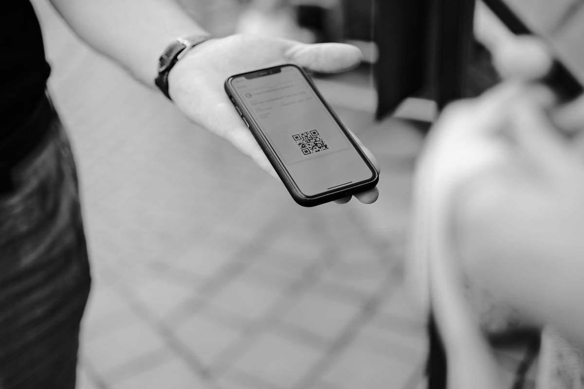 customer about to scan QR code to pay