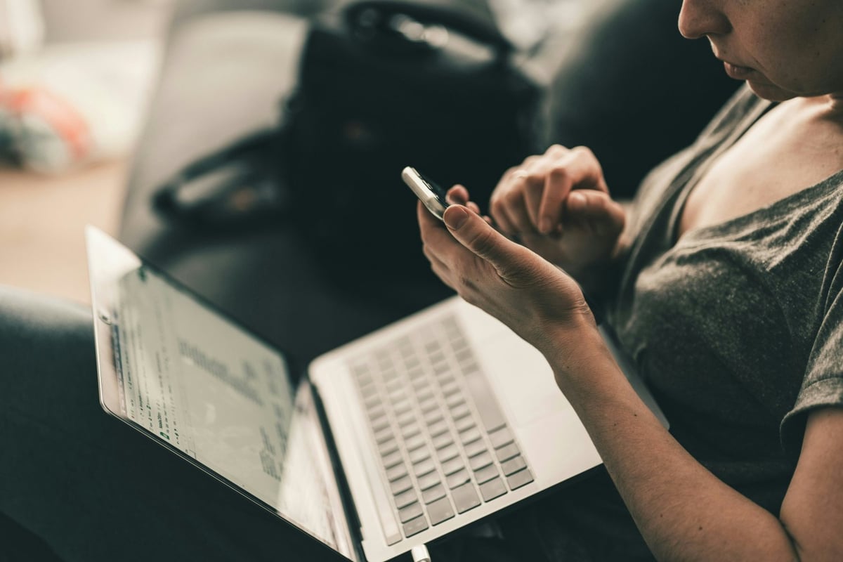 Parent reviewing notes and planning tutor payments