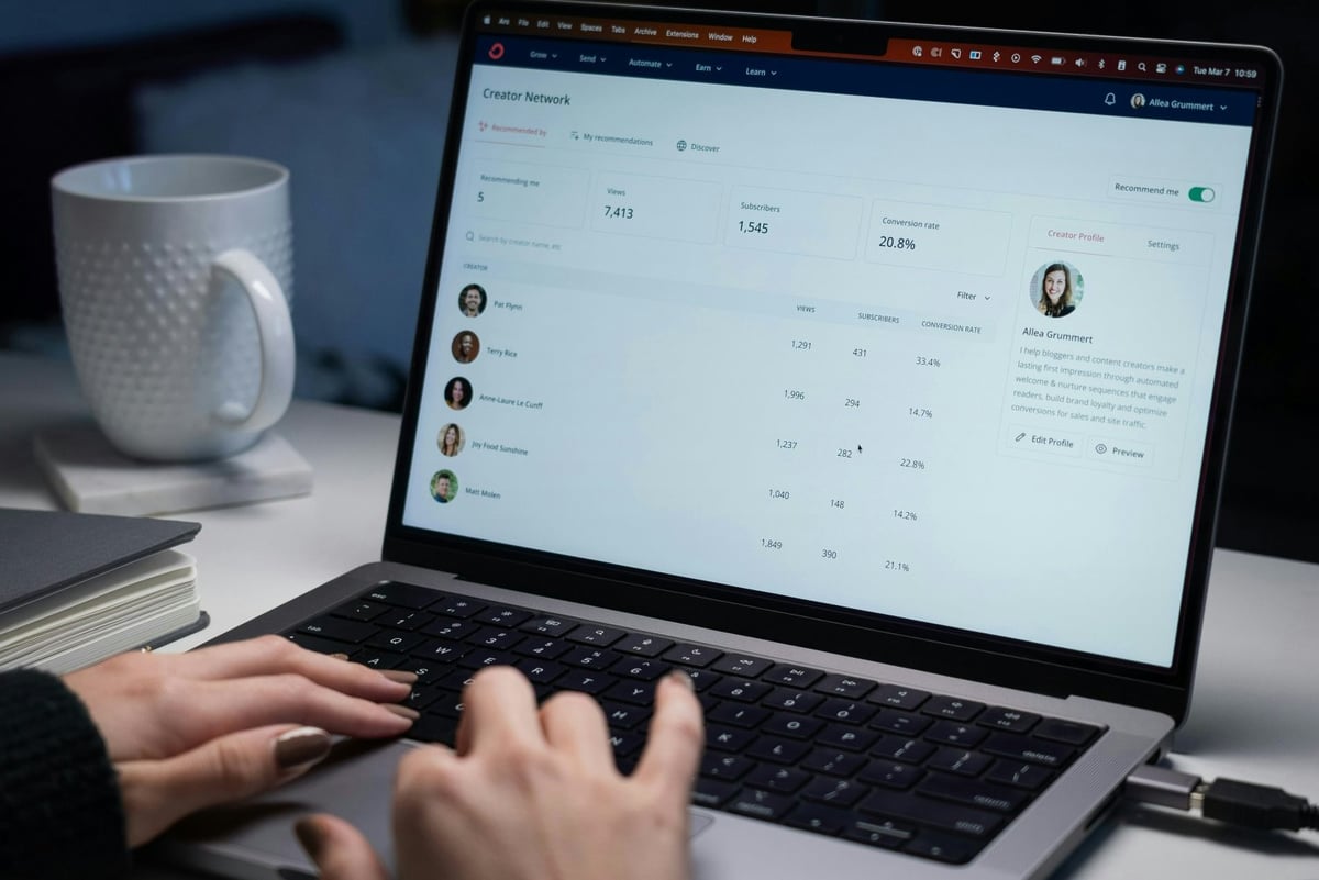 Person typing on a laptop while planning and setting up session payments