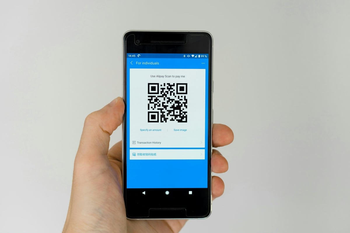 smartphone screen displaying a QR code for payment